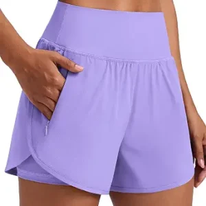 PINSPARK Women's 2 in 1 High Waisted Athletic Running Shorts 2 Zip Pockets | 3'' Inseam Dolphin Hem Workout Shorts, Quick Dry Gym Short, Elastic Biker Liner, Exercise/Fitness/Tennis